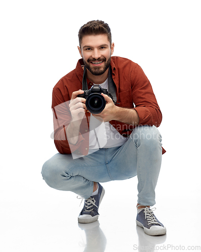 Image of smiling man or photographer with digital camera