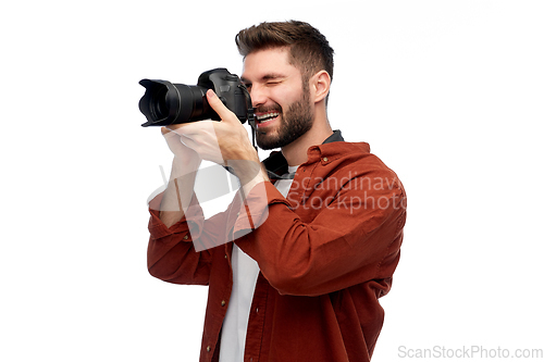 Image of smiling man or photographer with digital camera