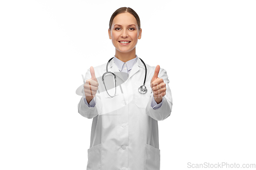 Image of smiling female doctor showing thumbs up