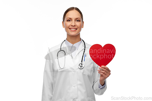 Image of smiling female doctor with heart and stethoscope