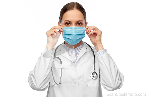 Image of happy female doctor wearing medical mask