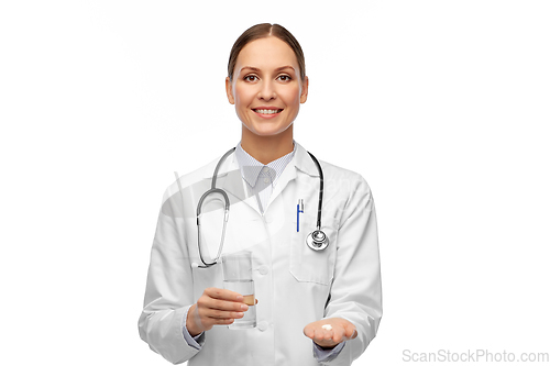 Image of doctor with medicine and glass of water