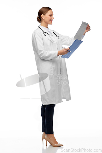 Image of happy smiling female doctor with clipboard