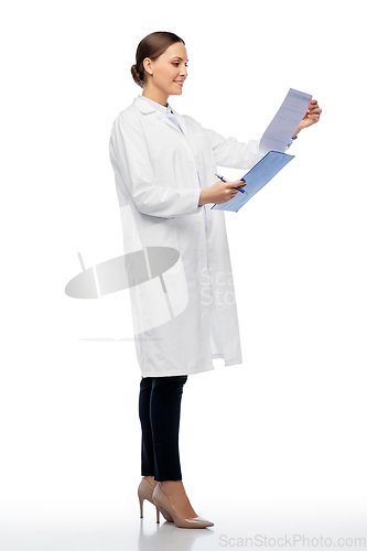 Image of happy smiling female doctor with clipboard