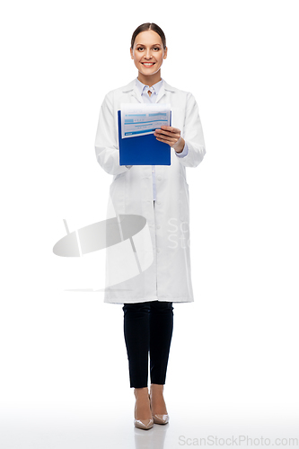 Image of happy smiling female doctor with clipboard