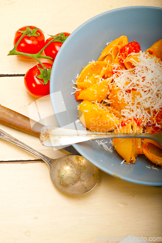 Image of Italian snail lumaconi pasta with tomatoes