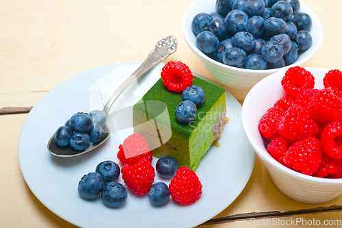 Image of green tea matcha mousse cake with berries