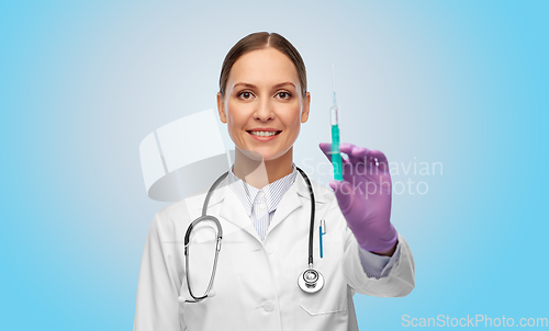 Image of happy female doctor with medicine in syringe