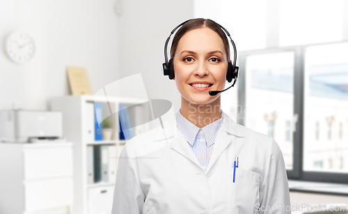 Image of smiling female doctor with headset