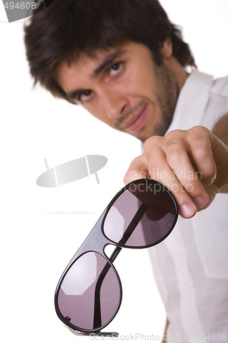 Image of showing his sunglasses 