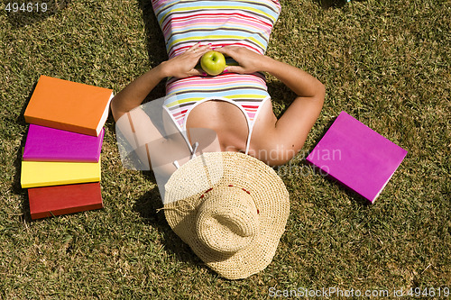 Image of student at the grass