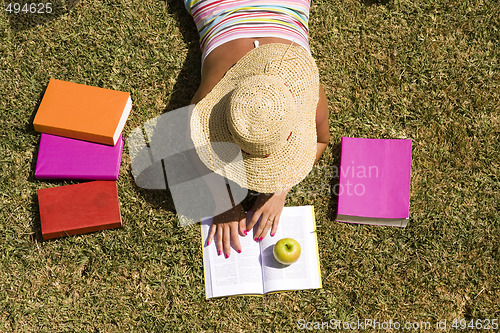 Image of student at the grass
