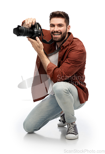 Image of smiling man or photographer with digital camera