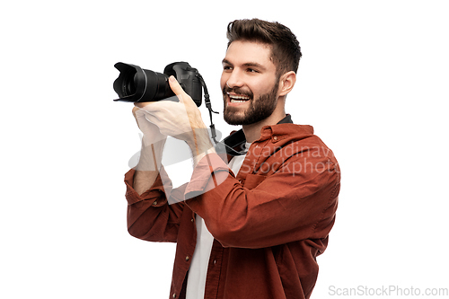 Image of smiling man or photographer with digital camera