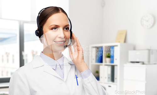 Image of smiling female doctor with headset