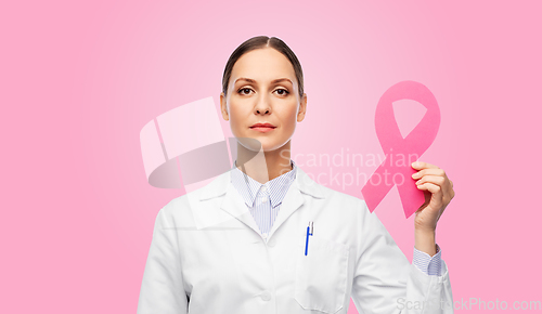 Image of female doctor with breast cancer awareness ribbon