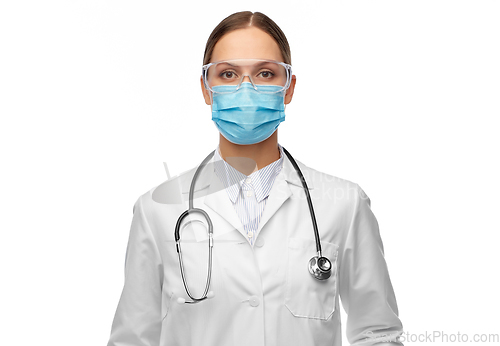 Image of female doctor in goggles and medical mask