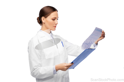 Image of female doctor with clipboard and medical report
