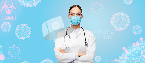 Image of female doctor in goggles and medical mask