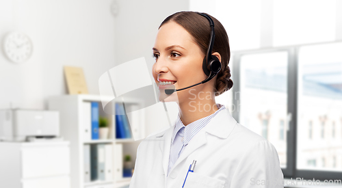 Image of smiling female doctor with headset