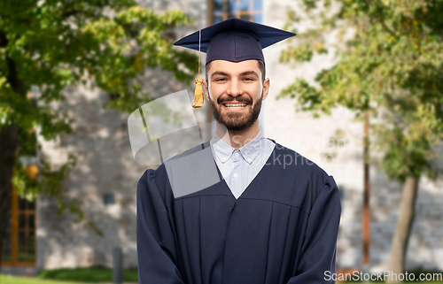 Image of graduate student in mortar board and bachelor gown