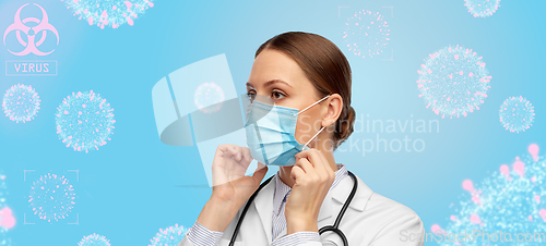 Image of happy female doctor wearing medical mask