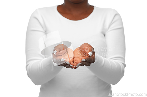 Image of close up of african woman with empty hands