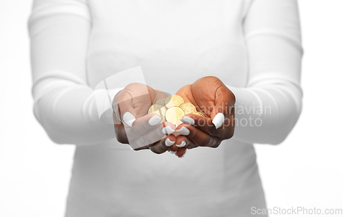 Image of close up of african american woman holding money