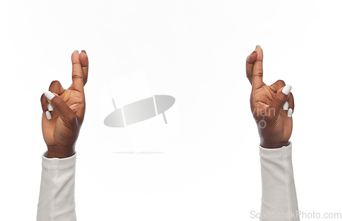 Image of african american woman showing crossed fingers