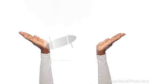 Image of close up of african american woman clapping hands