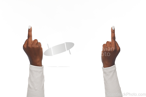 Image of hands of african woman showing middle fingers