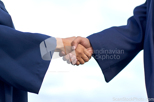 Image of graduate students or bachelors greeting each other