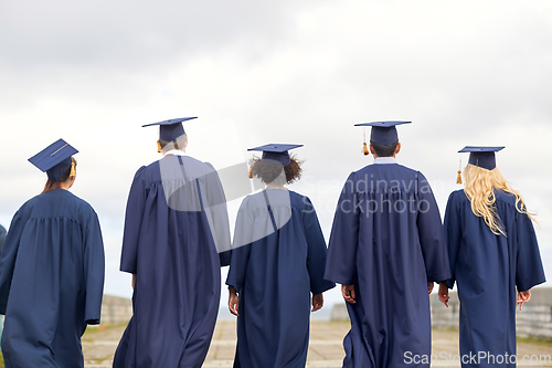 Image of graduate students or bachelors in mortar boards