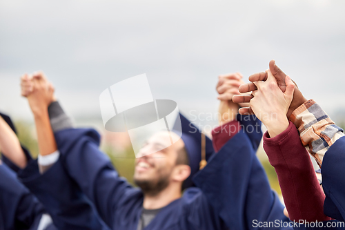 Image of happy students celebrating graduation