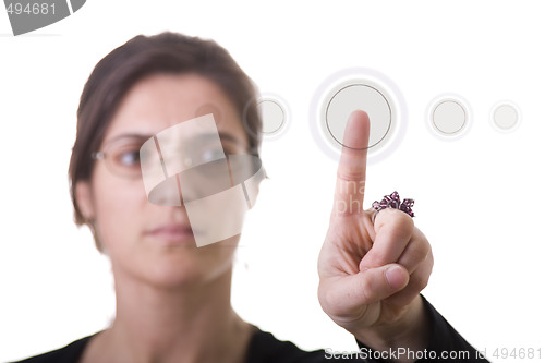 Image of businesswoman pressing a button 