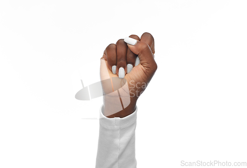 Image of hand of african american woman showing fists