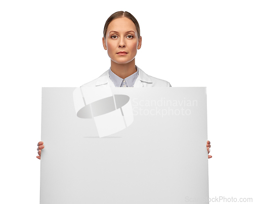 Image of female doctor or scientist holding white board