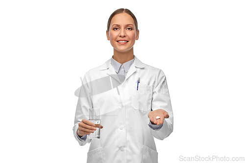 Image of doctor with medicine and glass of water