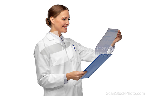 Image of happy smiling female doctor with clipboard