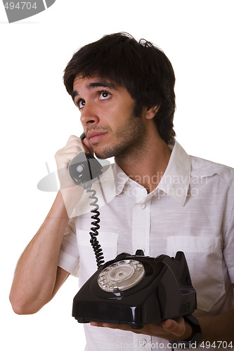 Image of talking on the telephone