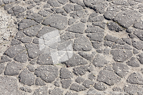 Image of cracked asphalt