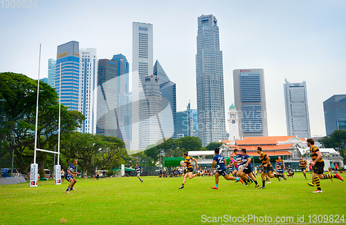 Image of Amateur rugby match. Singapore downtown