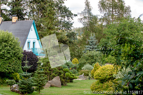 Image of Beautiful house in spring garden