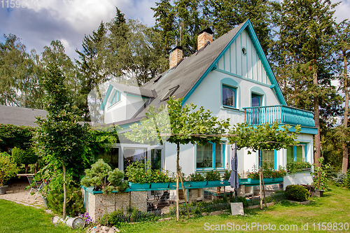 Image of Beautiful house in spring garden