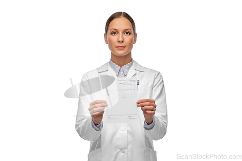 Image of female doctor with prescription blank