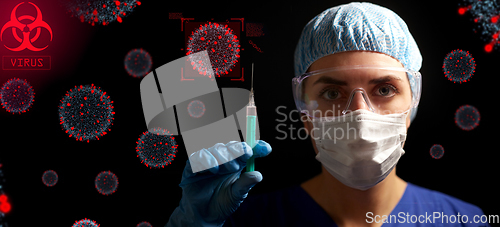 Image of doctor in face mask and goggles holding syringe