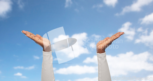 Image of close up of african american woman clapping hands