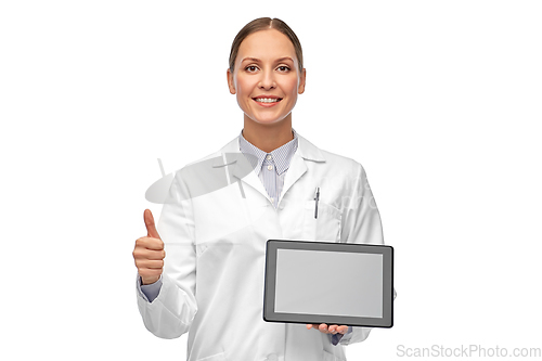 Image of happy female doctor with tablet pc shows thumbs up