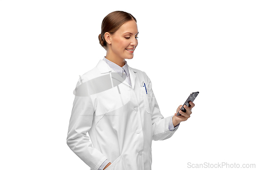 Image of happy smiling female doctor with smartphone