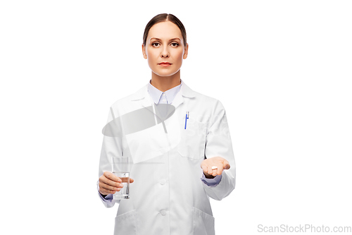 Image of doctor with medicine and glass of water